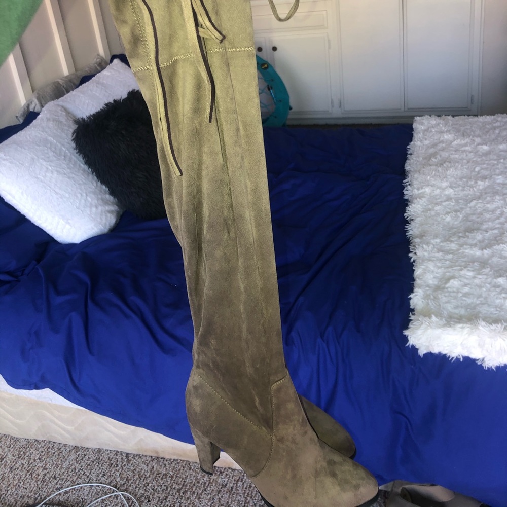 Thigh high heeled boots